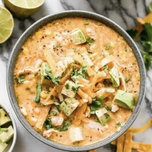 a bowl of chicken tortilla with tortilla chips