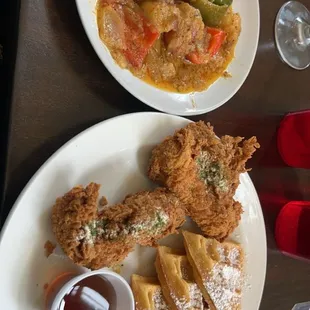 Nashville hot chicken and waffles with a side of potatoes (The hottest chicken I've encountered)
