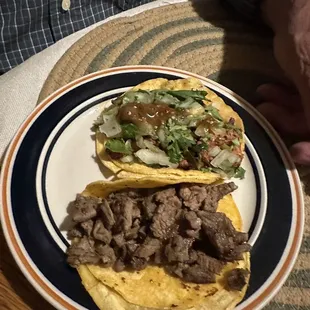 a man holding a plate of food