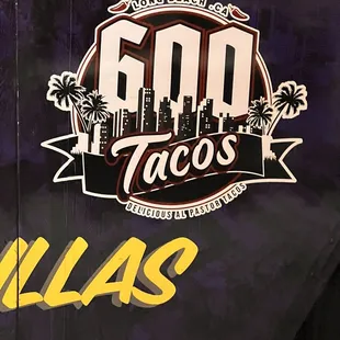 a man standing in front of a food truck