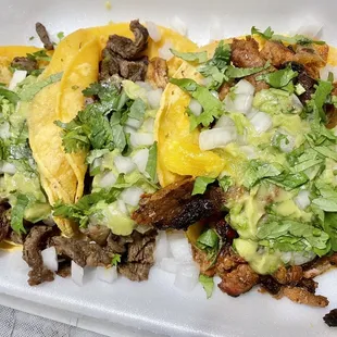 Carne asada and pastor tacos