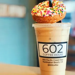 a donut on top of a cup