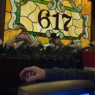 a person writing on a notepad