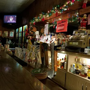 a bar with a lot of bottles of liquor
