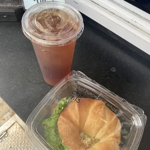 chicken salad croissant sandwich and raspberry iced tea