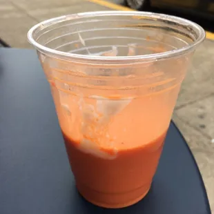 Carrot juice and strawberry smoothie (half-gone)