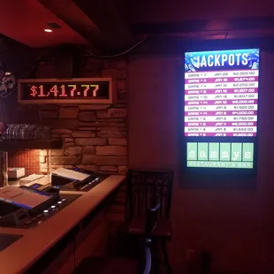 a neon sign for jackpots