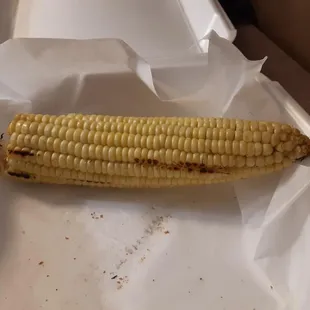 an uncooked corn on the cob