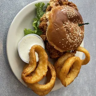 Chicken fried chicken sandwich with onion rings