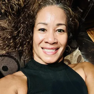 Gina E.