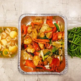 Fuzhou tofu, 5/5; Store-bought lobster in ginger scallion sauce w/ yee mein noodles, 5/5; garlic green beans, 5/5. IG: @take.a.bite.with.me