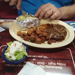 Hamburger Steak with fried okra, side salad, baked potato.