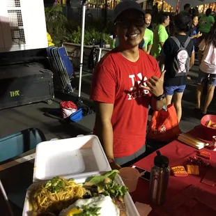 Josh (at the Yelp tent) and my grindz (yelp swag). Hawai'i Rice Fest! Aloha! Eat more Rice (3.5 Billion eat it everyday).