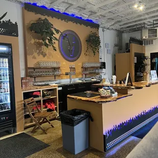 a bar with a clock on the wall