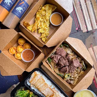 Drunken Noodle with Beef, Green Curry with Salmon, Crab Rangoon and Chicken Satay