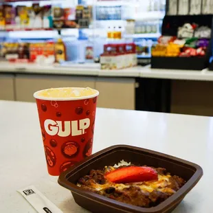 a bowl of chili and a cup of soup