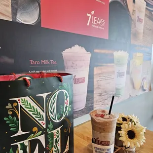 a cup of coffee and a bag of milkshake