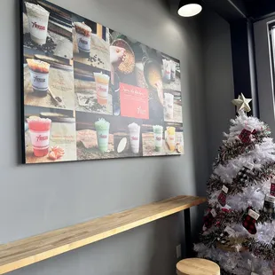 a christmas tree in front of a window