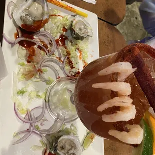 Oysters with large shrimp michelada