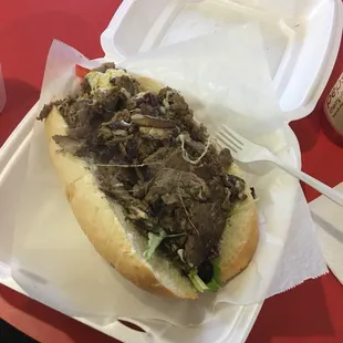 Cheese steak with fork for scale. So good!