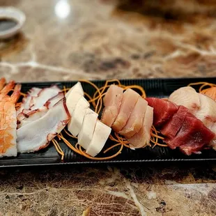 Mixed Sashimi (Ebi, Octopus, Escolar, Albacore, Blue Fin, Yellowtail and Salmon)
