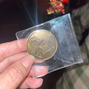 Lucky coin $1 off drinks with this baby
