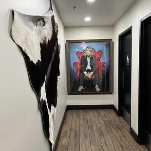 Large interesting picture outside the bathrooms
