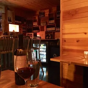 a glass of wine and a bottle of wine