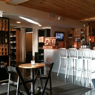 a bar with people sitting at it