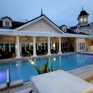 a large pool in the evening