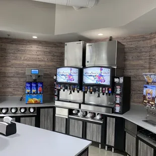 a kitchen with a counter top and a coffee machine
