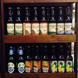 a shelf full of beer bottles
