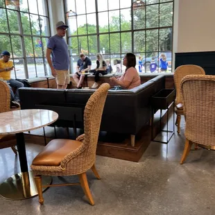 a group of people in a coffee shop