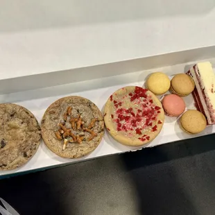 02.15.25 my haul - cookies (chocolate chip, chaos, and sugar with sprinkles), macarons, cheesecake