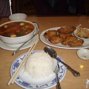 tom yum soup, rice, chicken wing