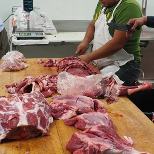 meat being prepared in a kitchen