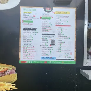 Menu on the side of the food truck