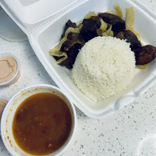 Good Rice &amp; Beans and Carne Frita Encebollada.