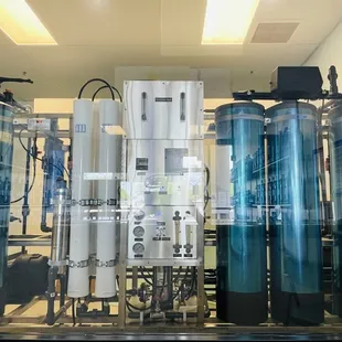 a row of water and alkaline tanks