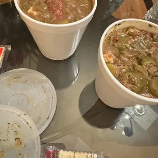 three bowls of soup on a table