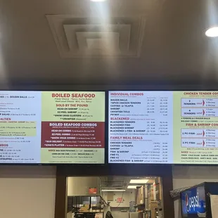 menus on the wall of a restaurant