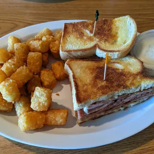 Ham &amp; Swiss Melt for $13.95 + $1.25 up-charge for Tots.