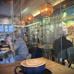 a cappuccino on a saucer