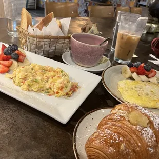 Veggies Scrambled Eggs Breakfast, almond croissant, Eggs Omelette Ham and Cheese Breakfast