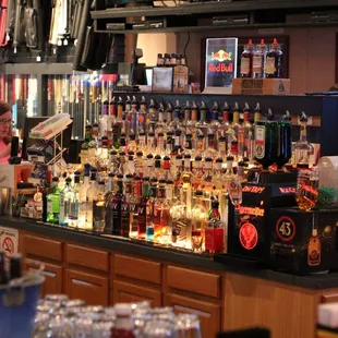 a woman behind the bar