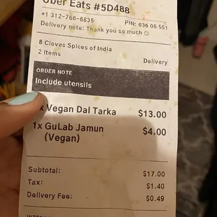 a person holding a receipt