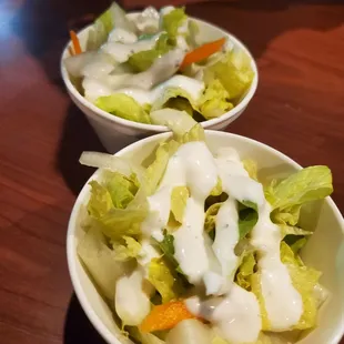 two bowls of salad