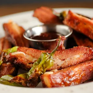 Pecan smoked spareribs, served with our signature BBQ sauce.