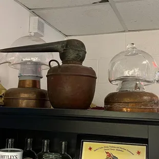 Glass still head replicas of what was found at Jamestown Island.