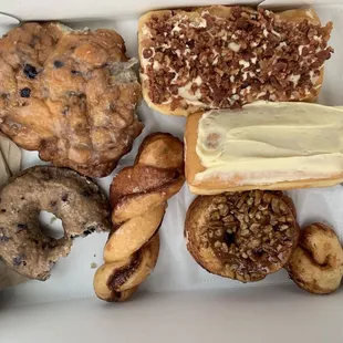 Blueberry Fritter, blueberry cake donut, donut twist, maple bacon, strawberry cheesecake, and sticky bun!